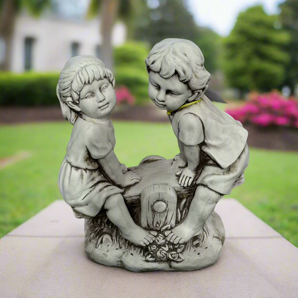 Boy & Girl On Seesaw Statue