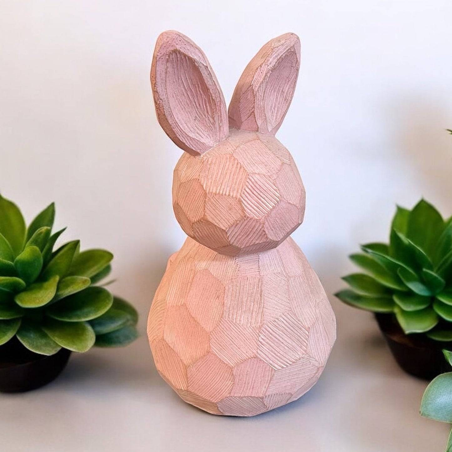 Carved Bunny Statues