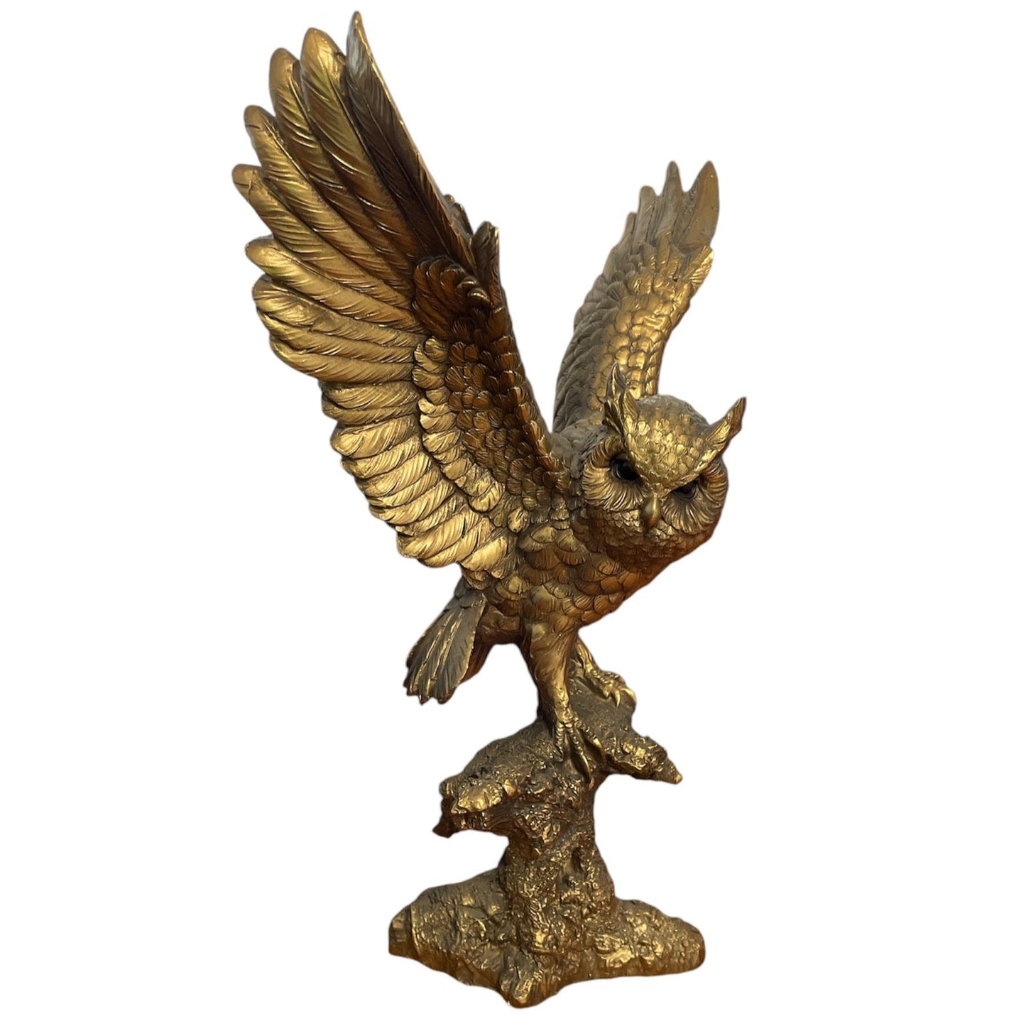 Bronze Owl Taking Flight