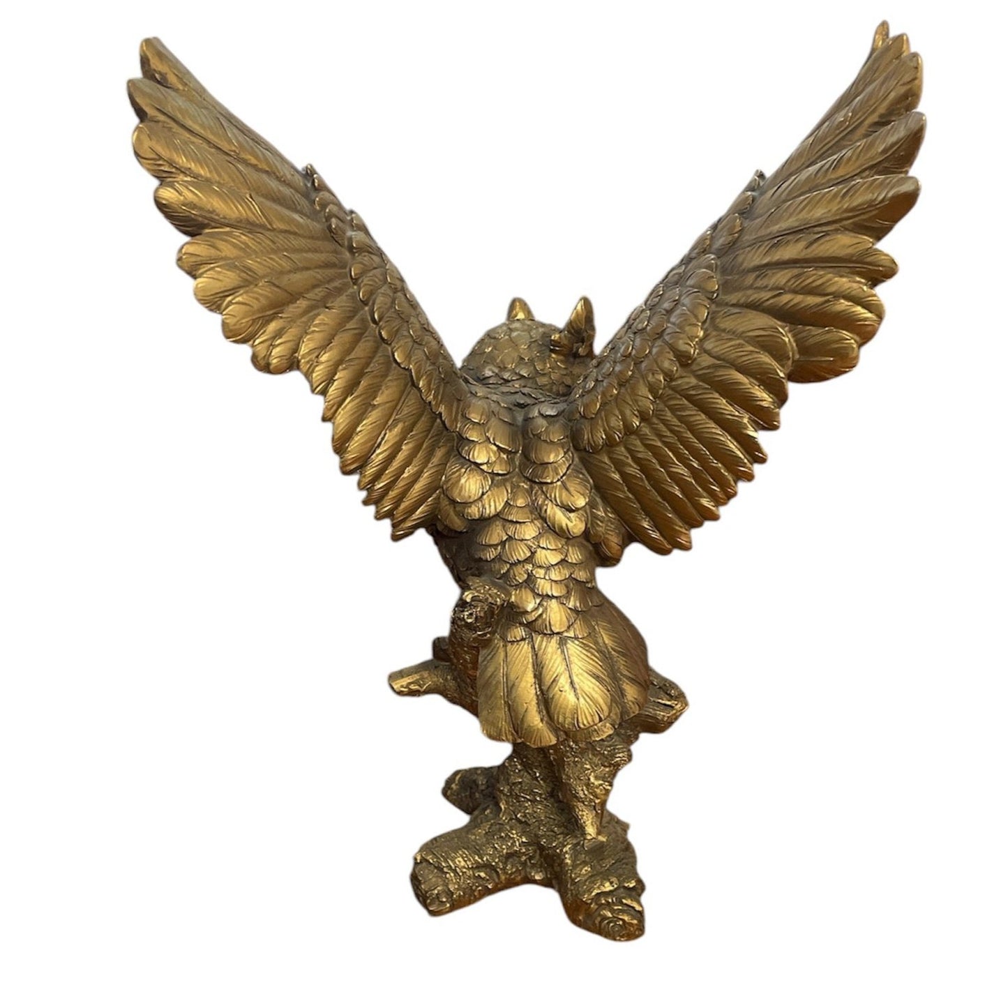 Bronze Owl Taking Flight