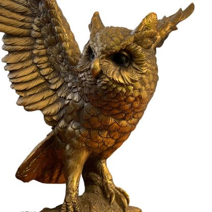 Bronze Owl Taking Flight