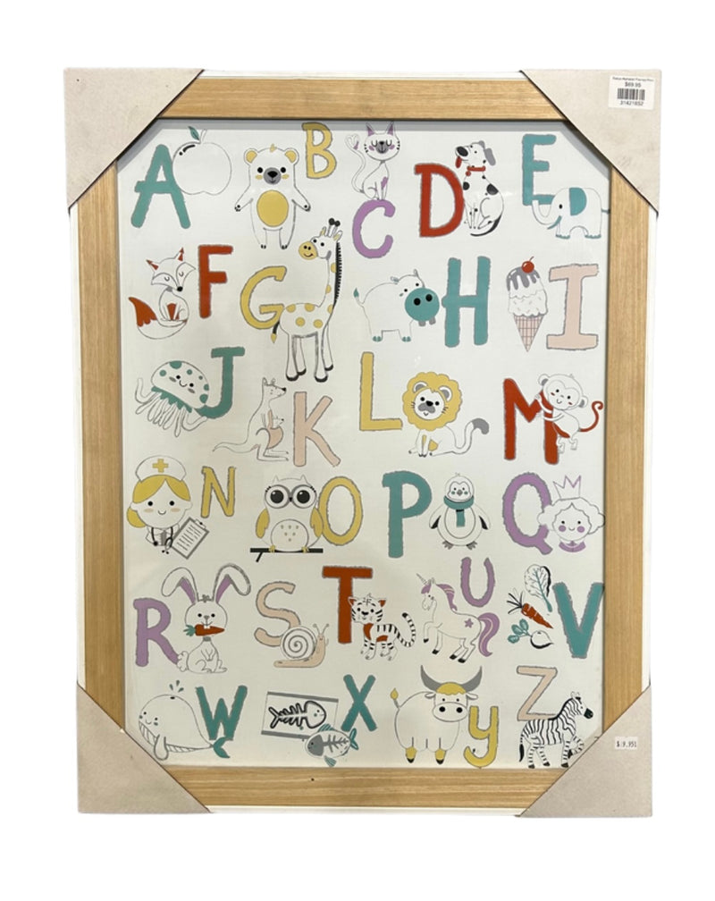 Babys Alphabet Framed Print