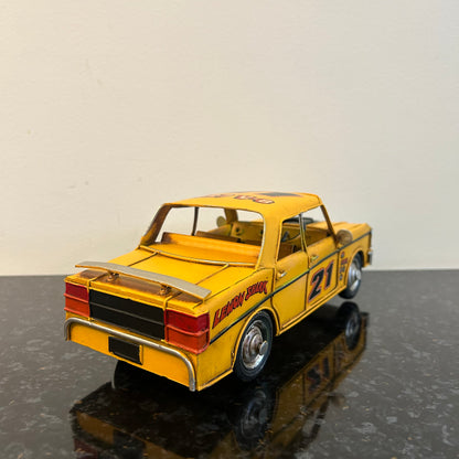 Yellow Metal Car Ornament