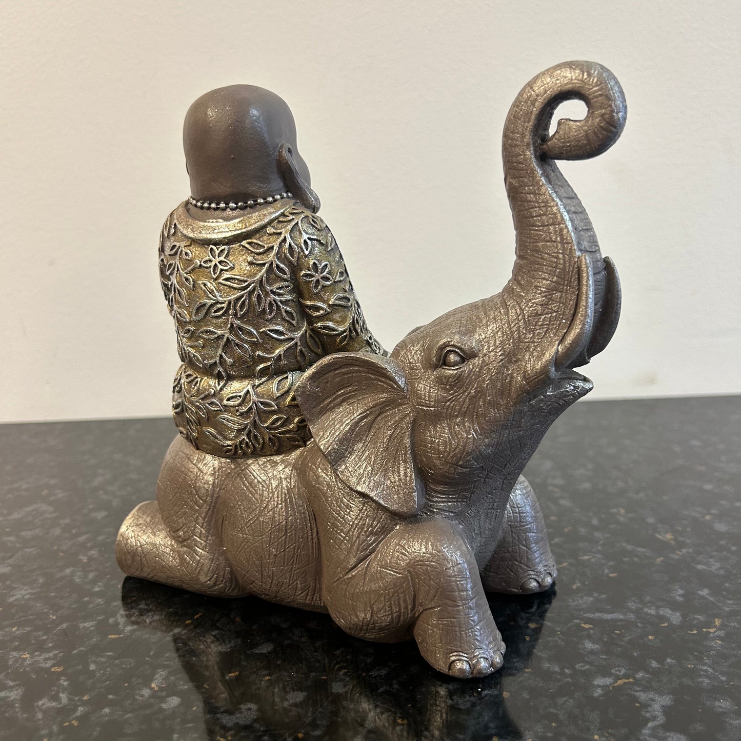 Happy Buddha On Elephant Statue