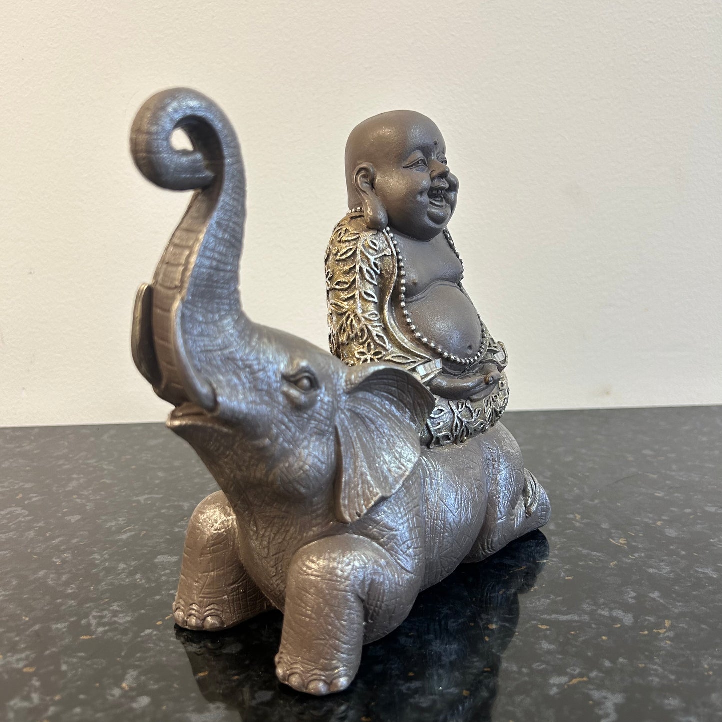 Happy Buddha On Elephant Statue