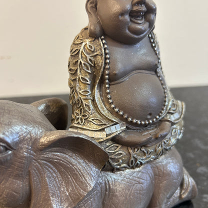 Happy Buddha On Elephant Statue